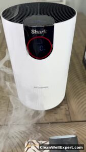 Close-up of Shark Clean Sense IQ display showing air quality dropping from 100 percent to 68 percent and 0 percent due to smoke, illustrating how infrared dust sensor detects particles and needs soft dry cloth cleaning