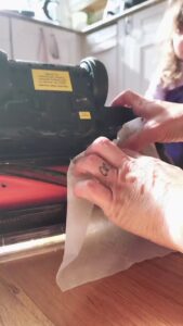 Cleaning wrapped hair and debris from Shark DuoClean Detect floorhead brushroll